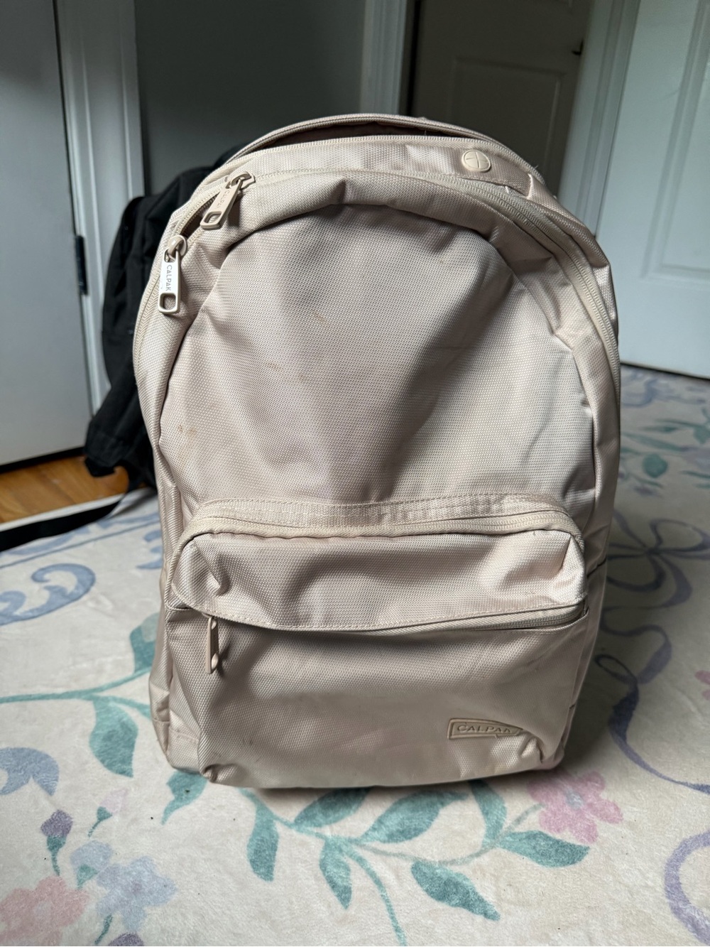 Calpak Cream Backpack with Front Zip Pocket